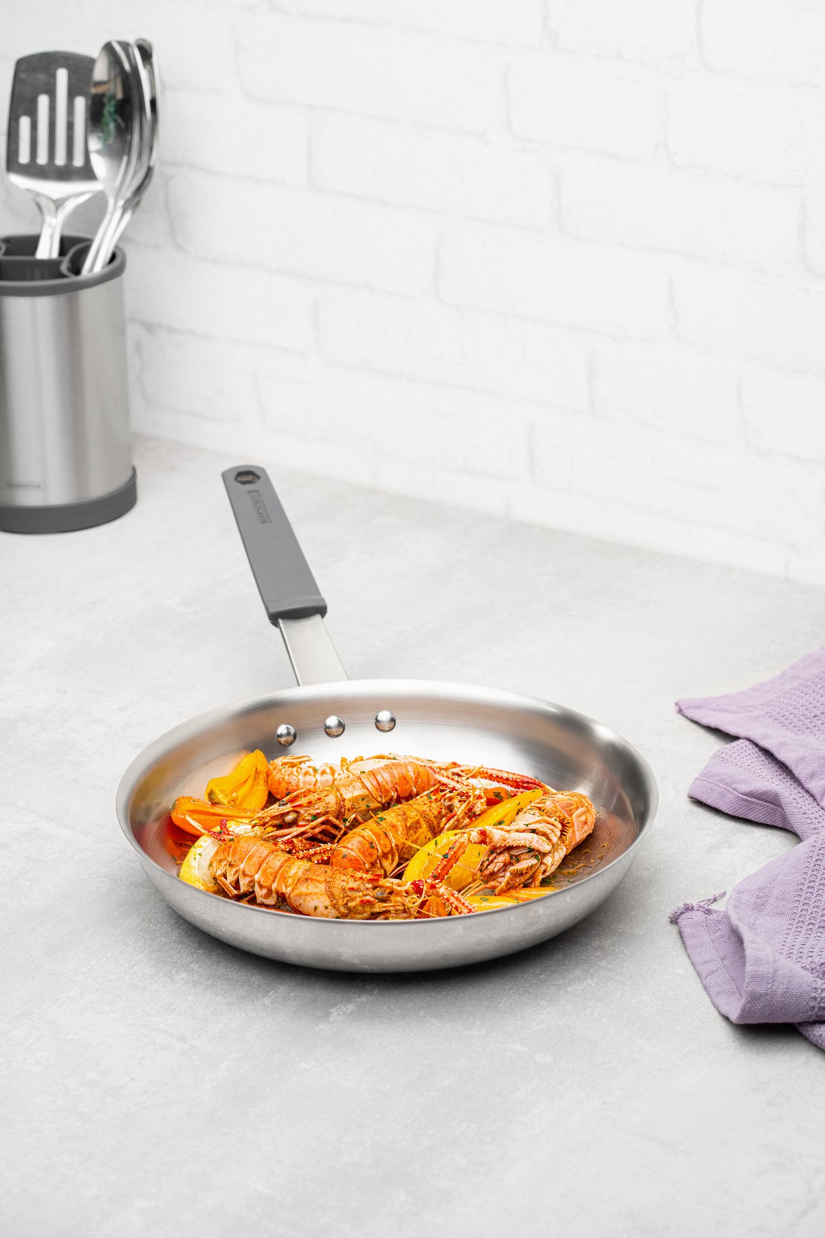 Professional Stainless Steel Frying Pan with Tri-Ply Base and Removable Grey Silicone sleeve, 20 cm